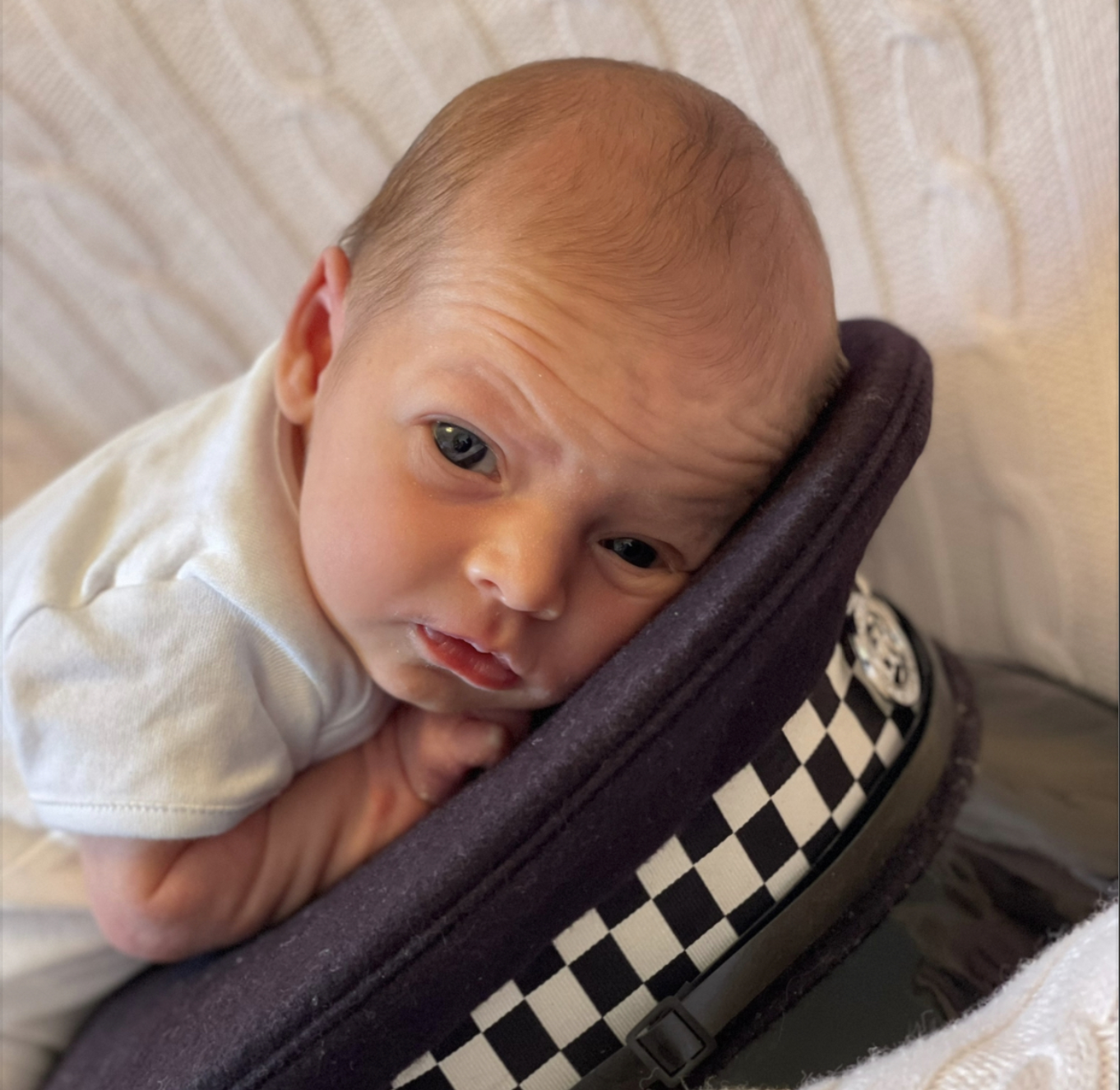 Baby Isla with Terry's police hat.