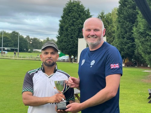 Black Country Health Gladiators captain Mohammed Ramzan (left) is pictured with Andy Forbes, West Mercia Police captain with the Blue Light Trophy