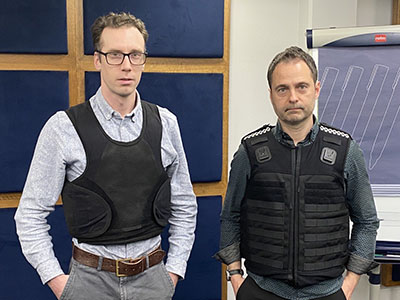 Two male police officers in third generation body armour Two male police officers in third generation body armour
